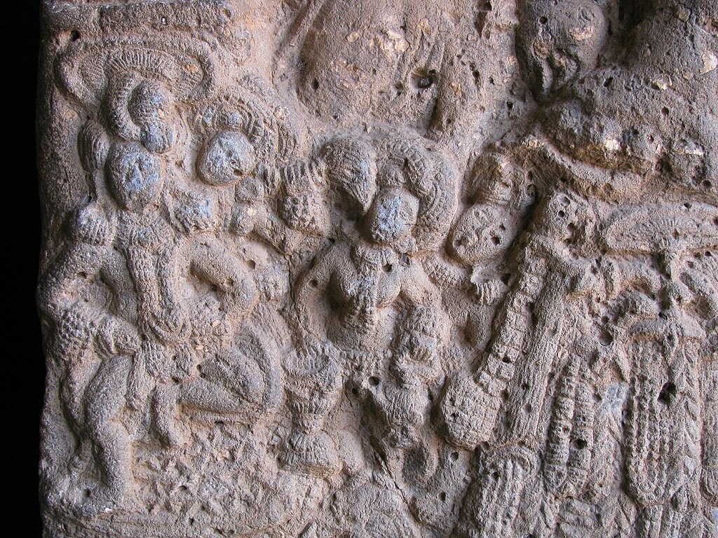 A carving at Bhaja Caves depicting an Woman playing Tabla | Bhaja Caves History and Architecture | Image from Wikipedia | Historyfinder.in